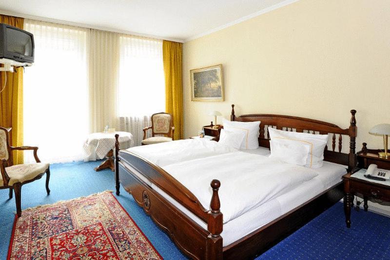 Goldener Apfel Hotel Кевелер Стая снимка